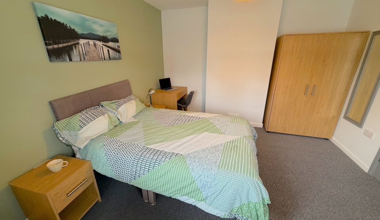 R4 - bedside, bed, wardrobe (light on)